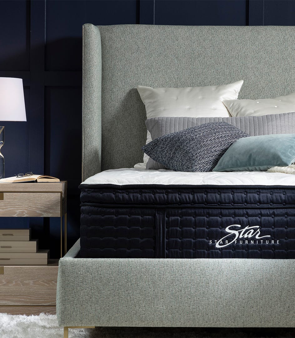a bed with a blanket on it